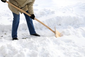 shoveling snow to prevent furnace failure