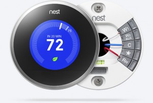 Touchscreen Nest Wifi thermostat with a blue display and text that reads 72 degrees